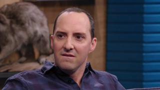 Tony Hale Wears a Blue Flannel Shirt and Fuchsia Sneakers
