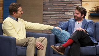 Zach Galifianakis Wears a Blue Jacket & Red Socks