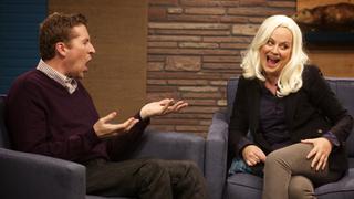 Amy Poehler Wears a Black Jacket & Grey Pants