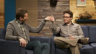 Seth Rogen Wears a Plaid Shirt & Brown Pants